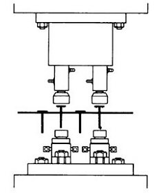 In this drawing, two studs are projection welded in each welder stroke, using an Equa-Press dual holder over a pair of studwelding electrodes held in PM-style holders.