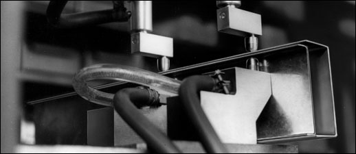 A Case History: Dual spot welding of panelled wall sections reduced welding costs enough to justify buying a welding machine to do the job in-plant. Equa-Press holder with 5-inch spacing, and special (but simple) tooling to provide two offset tip adapters and matching holders were used. Electrodes are standard TUFFCAP caps.